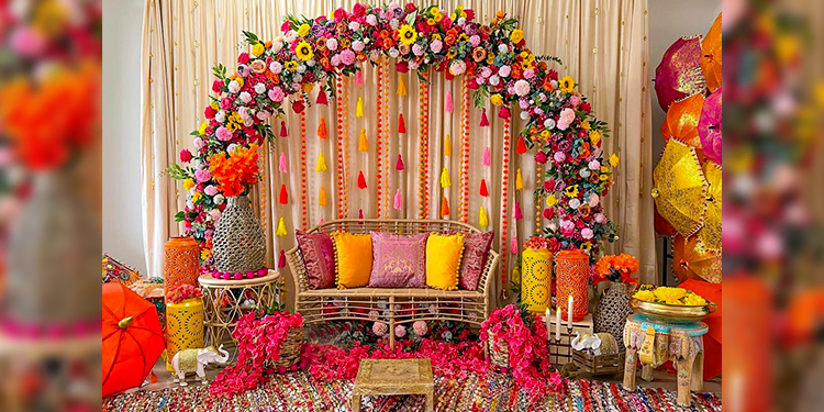 Rangoli-Inspired Backdrop: Traditional Meets Trendy