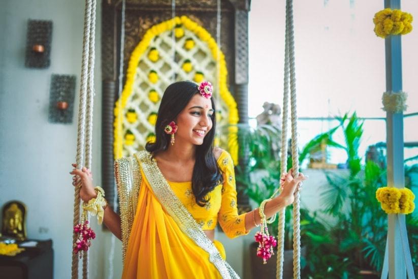 Classic Yellow Saree with Floral Jewelry